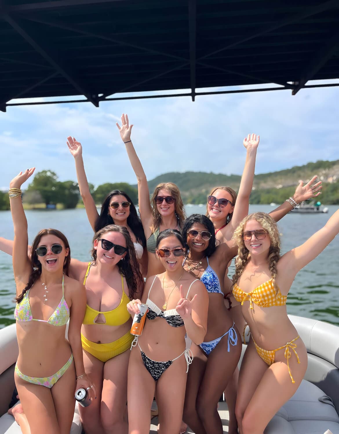 Group of women celebrating on Lake Austin boat rental Austin Texas